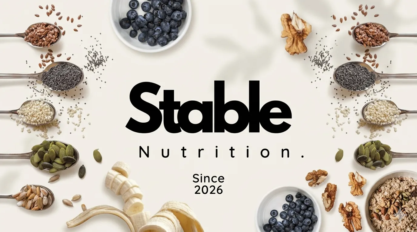 Stable Nutrition — Since 2026. Spoons of seeds, blueberries, banana, walnuts and oats around the wordmark.